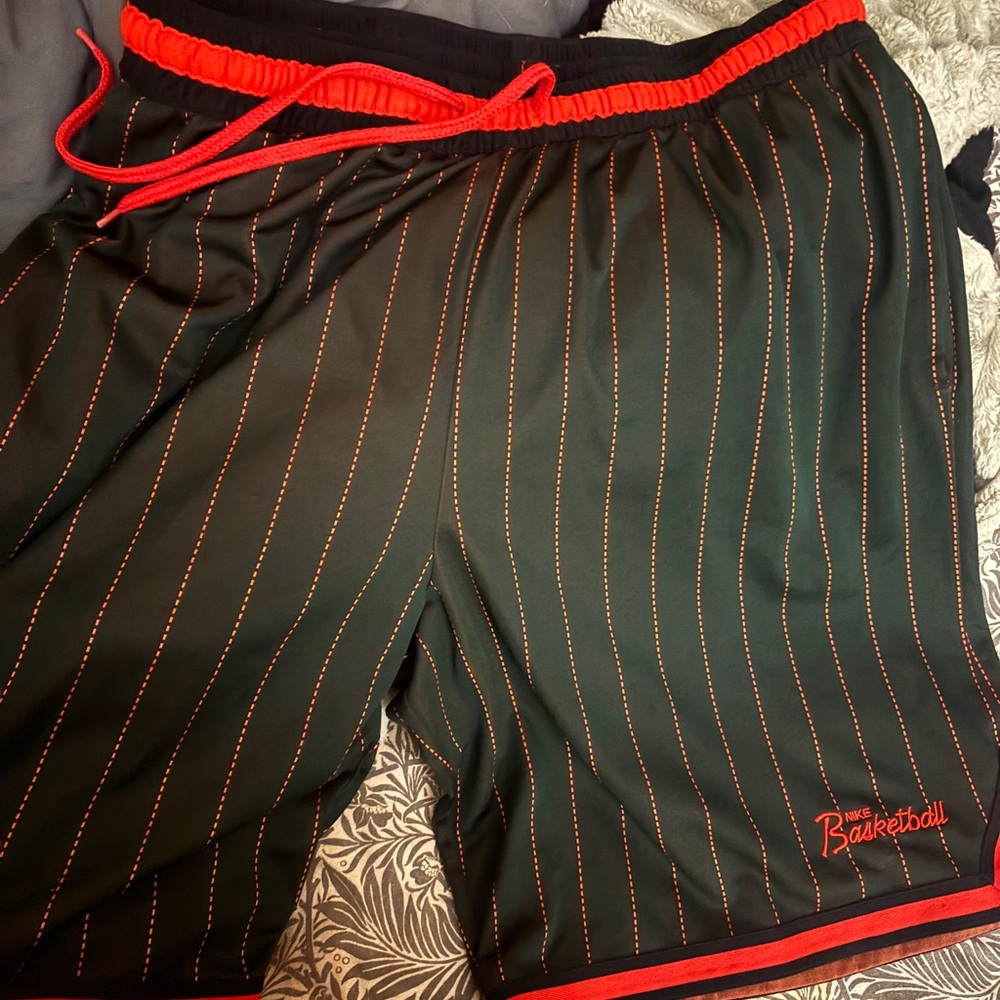 Nike Men's Black Athletic Shorts with Red Trim